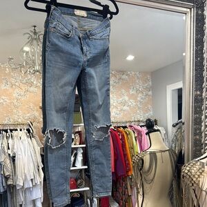 Distressed Blue Jeans